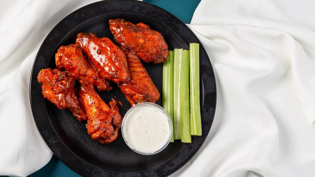 6 Classic Wings · 90-110 cal/wing. Enjoy our seasoned wings tossed in your favorite sauce, or none at all, and served with your choice of dipping sauces.