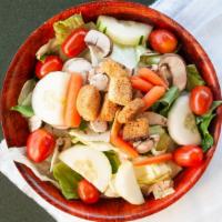 Individual Garden Salad · Fresh, mixed green salad with, tomatoes, cucumbers, carrots, and our own garlic parmesan cro...