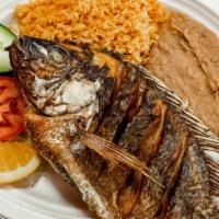 Mojarra Frita · Served with rice, beans, salad and tortillas.