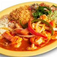 Camarones Rancheros Plate · Shrimp with onions, tomato, and bell peppers. Includes rice, beans, guacamole, salsa, sour c...