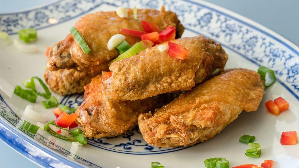 Salt & Pepper Chicken Wings · Fried salt and pepper chicken wings five per serving.