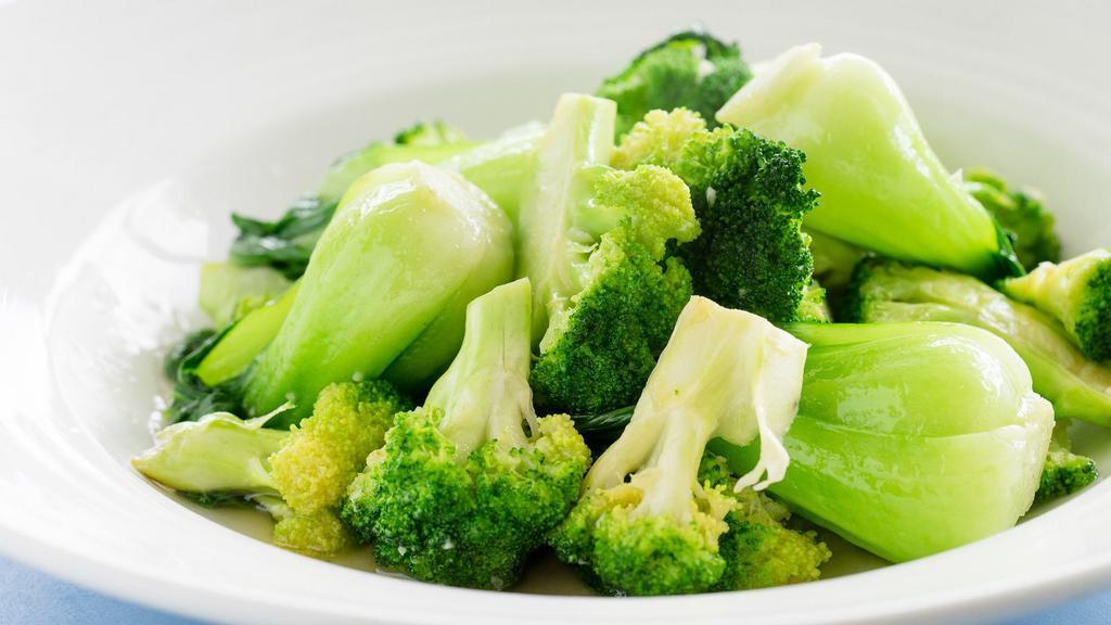 Garlic Seasonal Vegetables · Vegetyarian. Garlic seasonal vegetables, baby bok choy and broccoli half and half.
