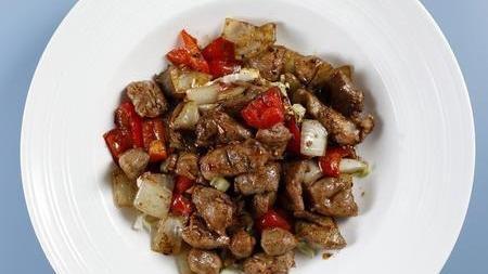 Xinjiang Cumin Lamb · Grilled lamb in Xinjiang cumin flavor with bell pepper, onion & cabbage.