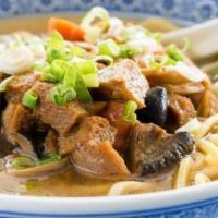 Shanghai Double Happiness Bowl · Ramen wheat noodles, gluten puff, peanut, day lily, woodear & shiitake mushrooms, carrot, sc...