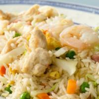 Yangzhou Stir Fry · Gluten-free. Rice with shrimp, ham, chicken, egg, sweet pea, carrot, shredded cabbage and sc...