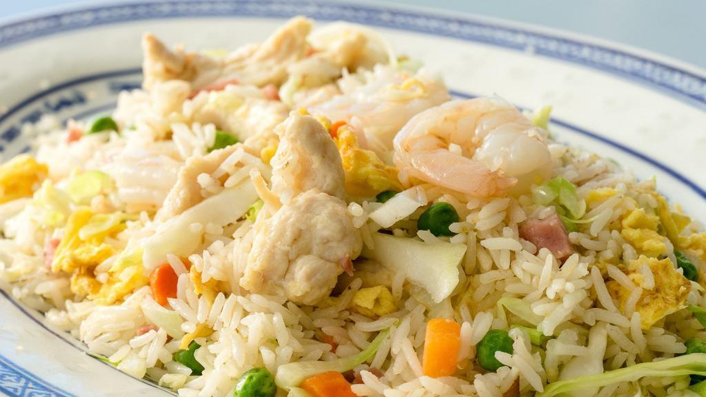 Yangzhou Stir Fry · Gluten-free. Rice with shrimp, ham, chicken, egg, sweet pea, carrot, shredded cabbage and scallion.
