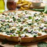 Palak Paneer Pizza Twist · This pizza has our signature pesto sauce, masala paneer, fresh diced mozzarella cheese, fres...
