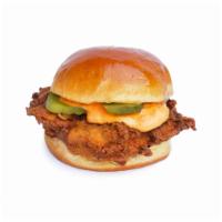 Spicy Bird - Fried Chicken Sandwich · Fried chicken breast, spicy bird sauce spread, and pickles served on a brioche bun