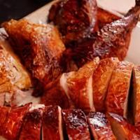 BBQ Smoked Turkey · House smoked turkey served with your choice of 2 signature sides.