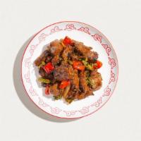 Black Pepper Beef · Tender beef, carrots, mushroom, white onions, wok-tossed in a rich black pepper sauce. Serve...