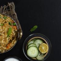 Annachikadai Mutton Biryani · Traditional biryani made by layering marinated, tender mutton followed by cooked rice and he...