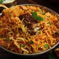 Annachi Mutton Biryani · Delicious rice dish made with aromatic rice and tender, juicy mutton pieces.