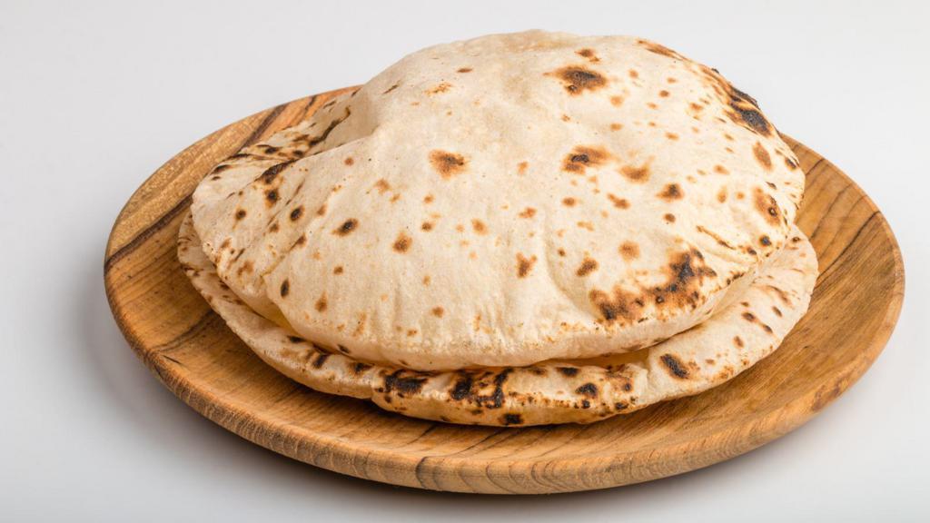 Chapati · A unleavened traditional flat bread made from finely ground whole wheat flour.