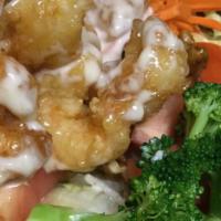 Shrimp Walnut Salad · Crispy shrimp and greens in sesame cream dressing.