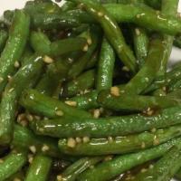 Green String Beans · Fresh green string beans toss cooked in garlic sauce.