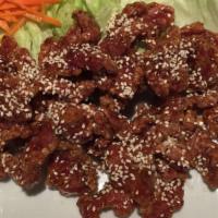 Manchurian Beef · Bettered beef slices coated with ginger-honey glaze.