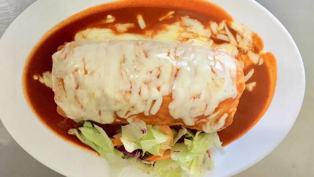 Burrito mojado de lengua · incluye cebolla, cilantro y salsa