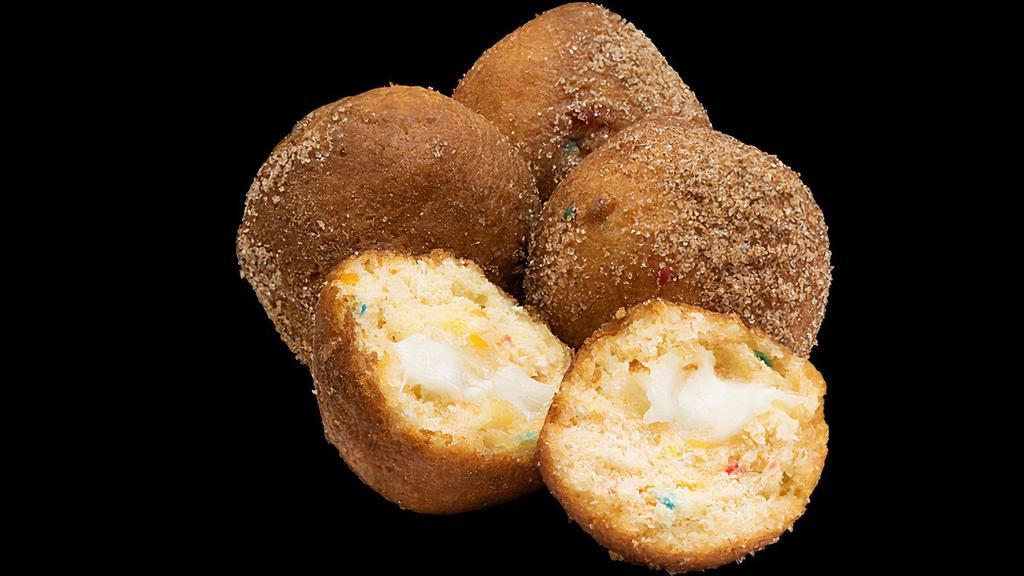 Birthday Cake Donut Holes · 4 count. Donut holes filled with colorful confetti and creamy vanilla frosting, dusted in cinnamon sugar. 680 cal.