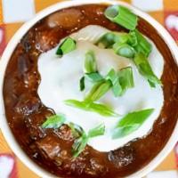 Side CluckChili · Our House-Made & Organic 3-Bean Chili. Topped with Sour Cream & Organic Green Onions.  Aller...
