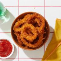 Onion Rings · Crispy and fried onion rings.