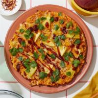 Vegan Empowered Bbq Pizza · Vegan pie with tomato sauce, pineapple, red onion, cilantro, bbq sauce, and vegan cheese.
