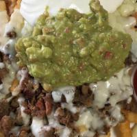 Carne Asada Fries  · Fries topped with carne asada, refried beans, cheese, guac, & sour cream (can be served with...
