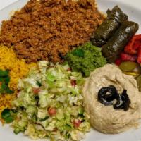 GROUND BEEF PLATE · Combo plate with ground Beef, Hummus, Israeli salad, Pickles, and Tahini sauce. Israeli sala...