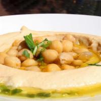 VEGAN HUMMUS  · Hummus served with 2 Pitas, Pickles, Tahini sauce and topped with choice of plain olive oil ...
