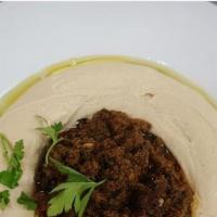 LAMB or BEEF HUMMUS · Hummus topped with  Beef or Lamb options. (Shawarma cooked with spices; Ground Beef is cooki...