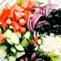 GREEK SALAD · Lettuce, cucumbers, onions, tomatoes and olives served with choice of dressing.