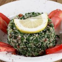 Taboulah · Chopped parsley, diced cucumber and tomato, zested with lemon juice, olive oil and salt.