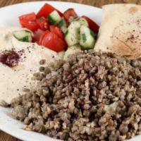 Mujaddara Wrap · Bulgur and cracked wheat, cooked with sauteed onions and olive oil, wrapped with lettuce, to...