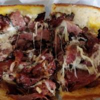 Tony's Hot Pastrami · New York style pastrami sliced thin and served hot on your choice of bread with Swiss cheese