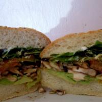 Spiro's Special · Avocado, Lettuce, Tomatoes, Red Onions, Green Bell Peppers, Mushrooms, and Sprouts served co...