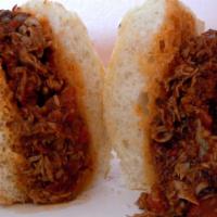 BBQ Beef · Tender Roast Beef smothered in Spicy BBQ sauce served hot on your choice of roll