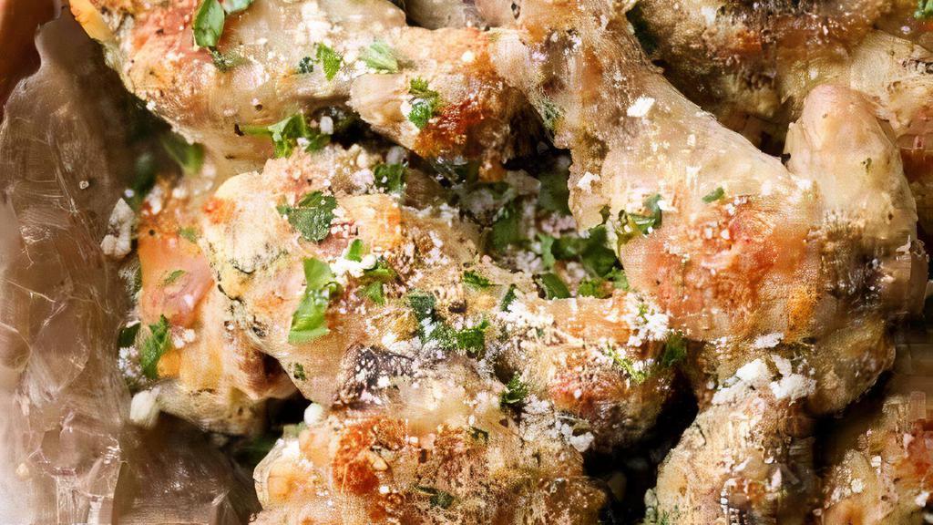 Garlic Parmesan Wings · Crispy, saucy, and garlic Parmesan wings.