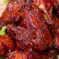 Hot Honey BBQ Wings · Crispy, saucy, and hot honey BBQ wings.