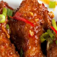 Thai Chili Wings · Crispy, saucy, and Thai chili wings.