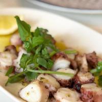 Octapodaki Tou Yiorgou/Octopus · Grilled octopus with lemon, oregano & Greek olive oil.