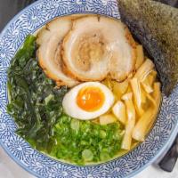 Traditional Shio Ramen · Chicken broth with salt base topped with pork chashu, green onions, bamboo shoots, wakame se...
