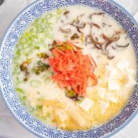 Creamy Vegetarian Ramen · Emulsified vegetarian broth topped with tofu, green onions, bamboo shoots, mushroom, brussel...