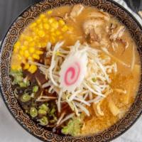 Sapporo Miso Ramen · Chicken broth with miso base topped with chashu, green onions, bamboo shoots, corn, bean spr...