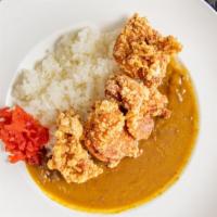 Karaage Curry · Beef based curry with Japanese fried chicken, rice, and a small salad
