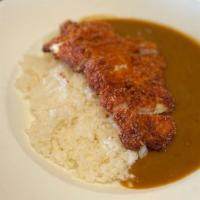 Chicken Katsu Curry · Beef based curry with chicken cutlet, rice, and a small salad