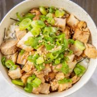 Small Chashu Rice Bowl · Rice bowl with cubed pork chashu, green onions, seaweed, and sesame seeds
