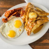 French Toast Plate · Includes two eggs, two bacon or sausage.