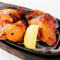 Tandoori Chicken · Gluten-free. Chicken on bone in a traditional classic tandoor marinade. Served with organic ...