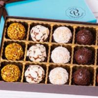 Gift Box (15 brigadeiros) · Classic flavors in each box
dark chocolate & sprinkles
dark chocolate & almonds
dark chocola...