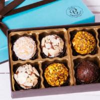 Gift Box (8 brigadeiros) · Classic flavors in each box
dark chocolate & sprinkles
dark chocolate & almonds
dark chocola...