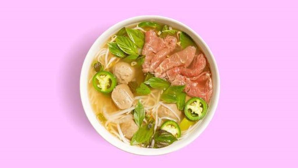 Rare Steak Pho · Rare steak in beef broth garnished with onion, scallion, cilantro, and a side of bean sprouts, Thai basil, jalapeño.